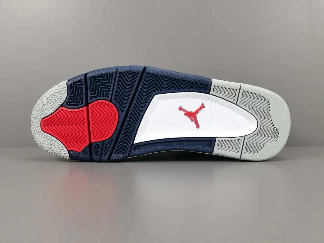 Nike Air Jordan 4 Retro white varsity red midnight navy leather sneakers outsole view