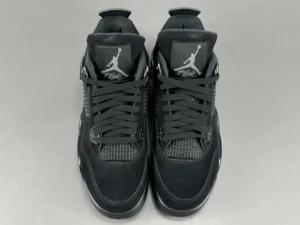 Nike Air Jordan 4 Retro Black Cat black nubuck sneakers with mesh detailing and rubber sole