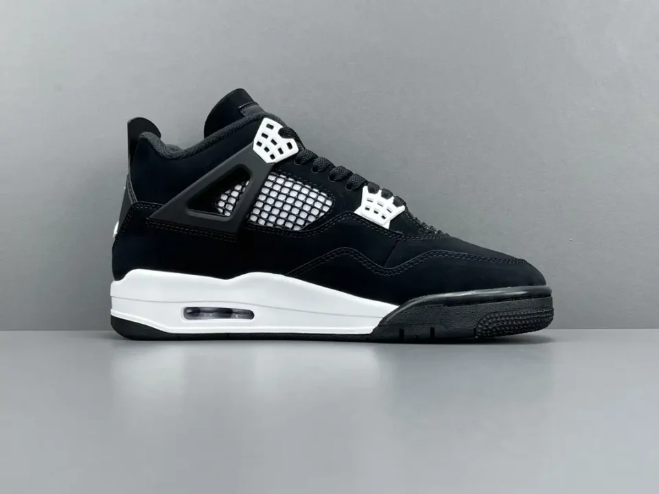 Nike Air Jordan 4 Retro black white mesh leather sneakers with visible air sole unit