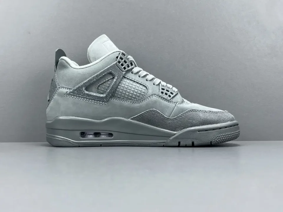 Nike Air Jordan 4 Retro Grey Suede sneakers with mesh panels and rubber sole