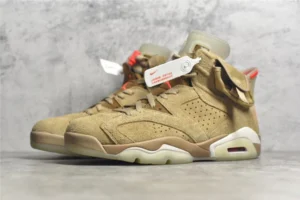 Air Jordan 6 Retro Travis Scott British Khaki sneakers featuring a tan suede upper, red accents, and signature branding.