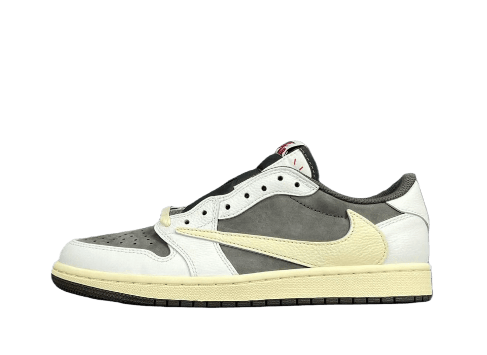 Travis Scott x Air Jordan 1 Low sneaker in Sail and Crimson colorway, featuring a blend of white, grey, and yellow accents, displayed against a transparent background.