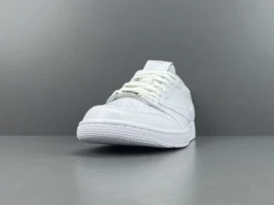 Nike Air Jordan 1 Low Triple White leather sneakers with white laces and perforated toe box