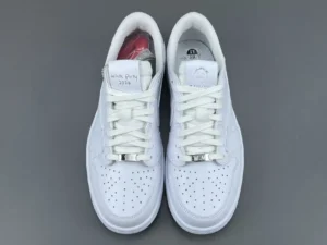 Nike Air Force 1 Low White Party 2024 white leather sneakers with silver lace locks and embroidered tongue tags
