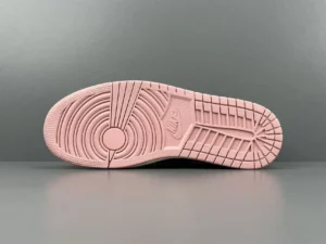 Nike Air Jordan 1 Low Light Pink rubber sole sneakers with detailed tread pattern and Nike logo embossment