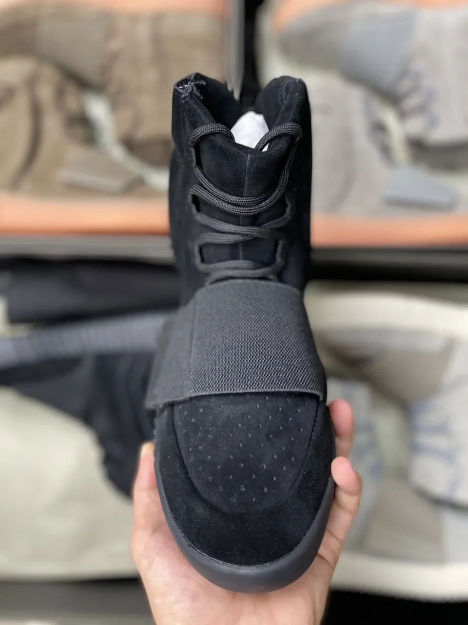 Adidas Yeezy Boost 750 black colorway suede and mesh sneakers with midfoot strap