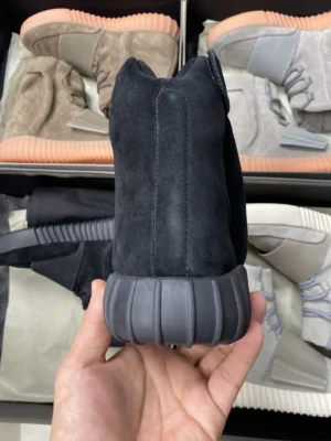 Adidas Yeezy Boost 750 black colorway suede sneakers with ribbed rubber sole