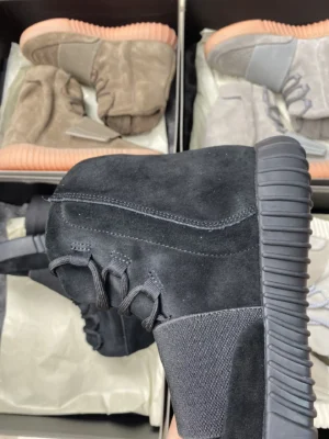 Adidas Yeezy 750 Boost black colorway suede and neoprene high-top sneakers with ribbed rubber sole