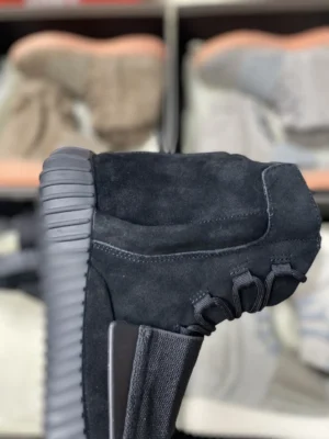 Adidas Yeezy 750 Boost black colorway suede sneakers with ribbed rubber sole