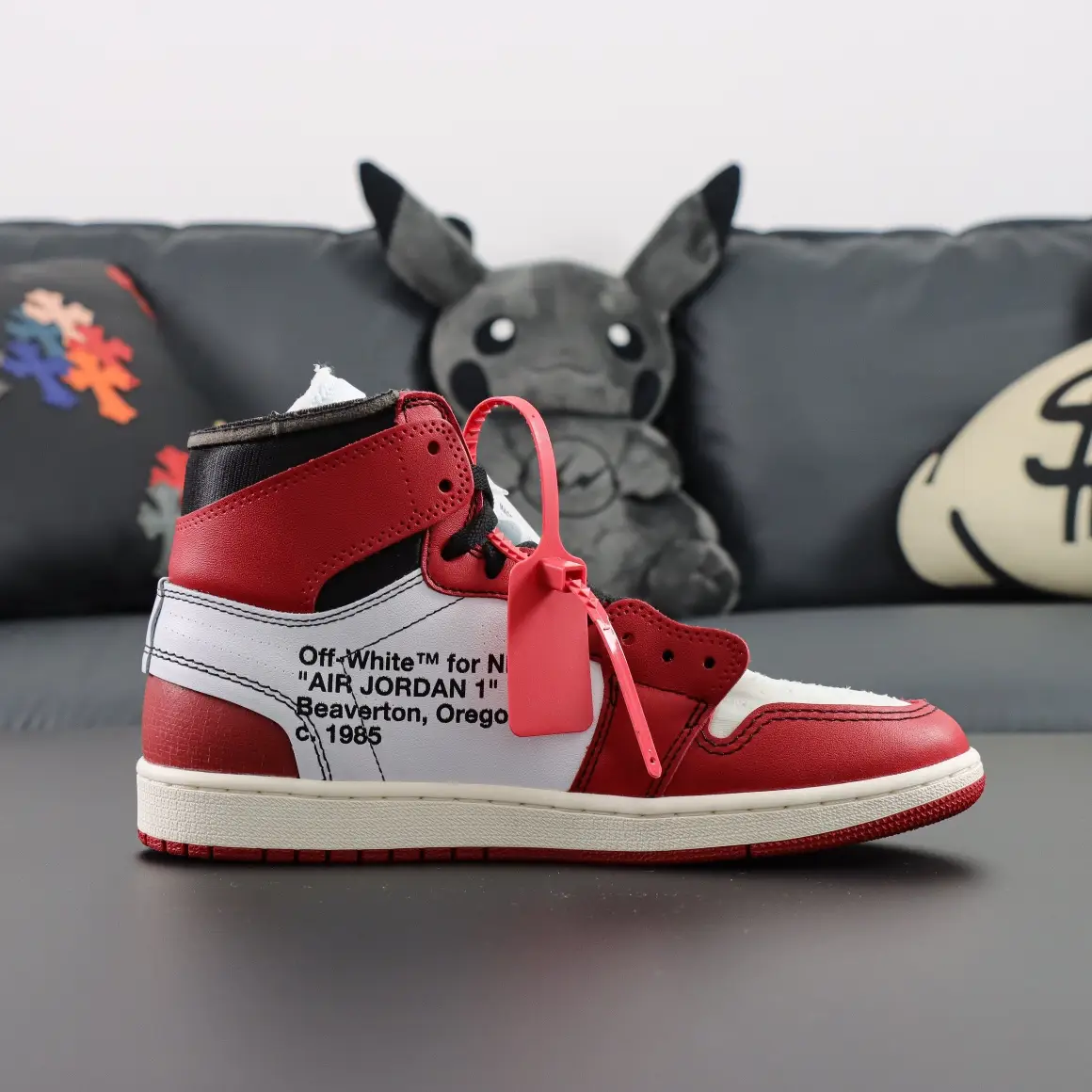 Nike Air Jordan 1 Off-White Chicago red white black leather sneakers with signature text and red zip tie