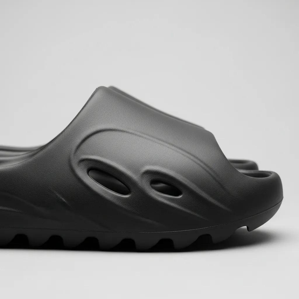 Close-up of authentic Yeezy slides highlighting the unique tread pattern and high-quality materials