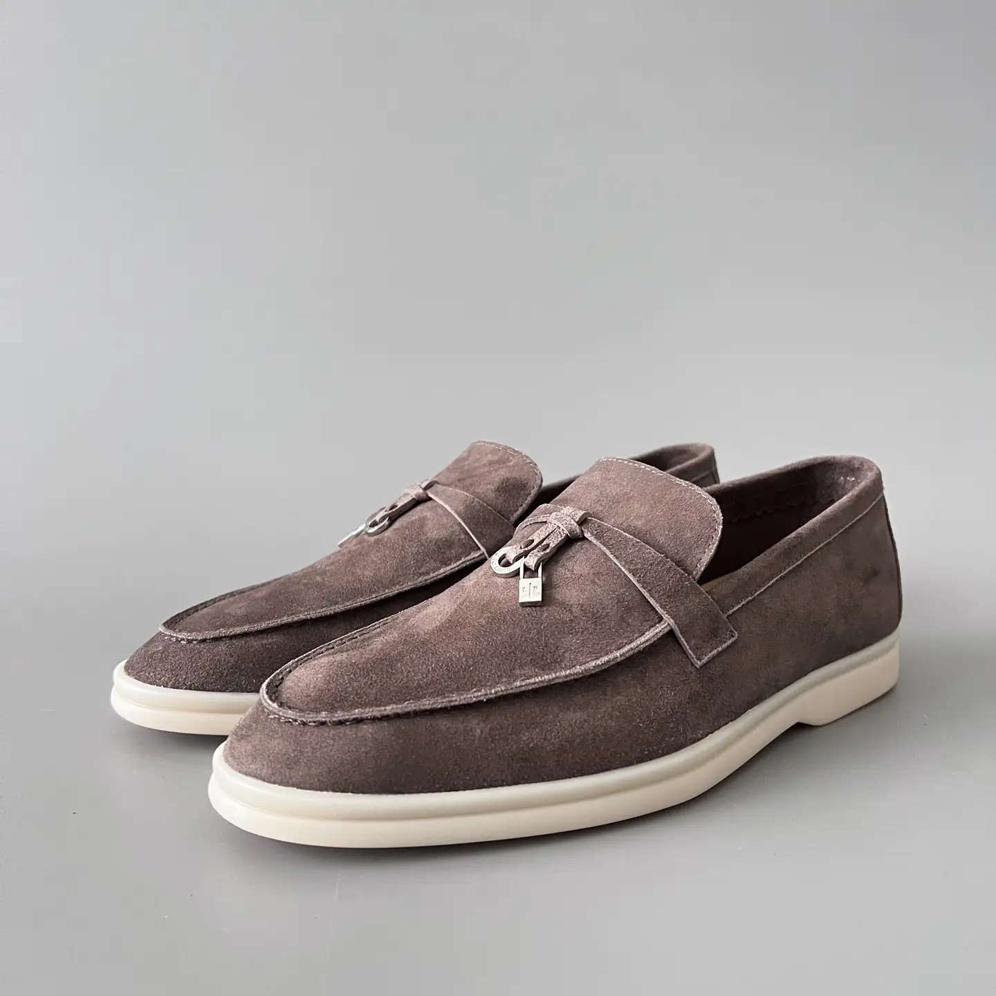 Loro Piana round toe low top women's loafers.
encoding