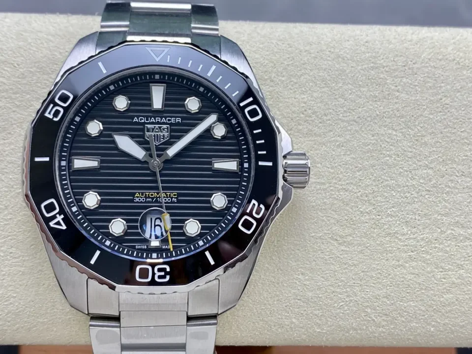 The all-new TAG Heuer Aquaracer watch is designed for diving and features a black sun patterned frosted dial