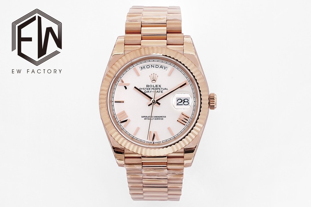 Rolex Day-Date Solid Rose Gold Fluted Bezel White Roman Dial President 40MM 228235-0032