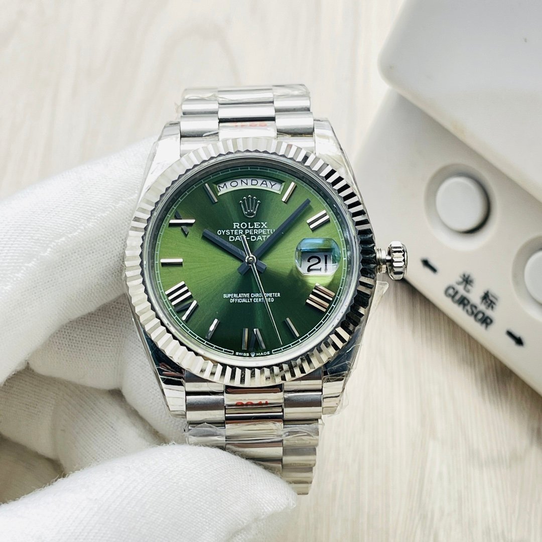 Rolex Day-Date 40 White Gold Fluted Bezel Green Roman Dial President Bracelet 40MM 228239-0033