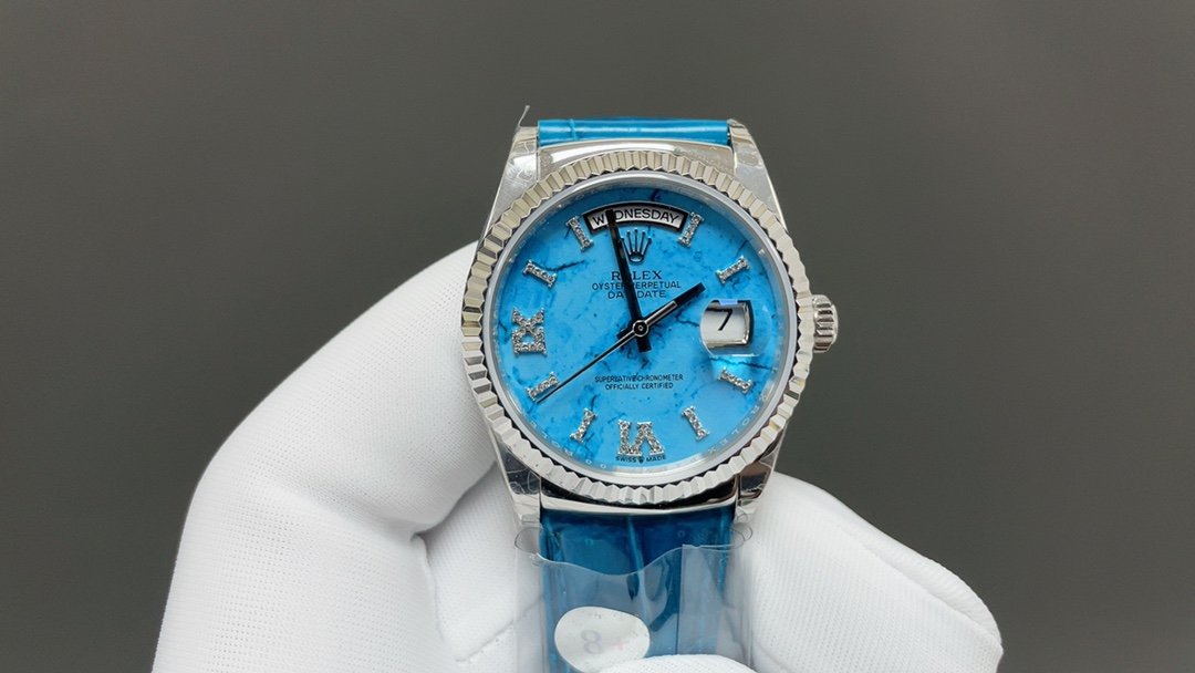 Rolex Day-Date 36 White Gold Turquoise Dial Diamond-Set Roman Numerals Fluted Bezel President Bracelet 36MM M128239-0044